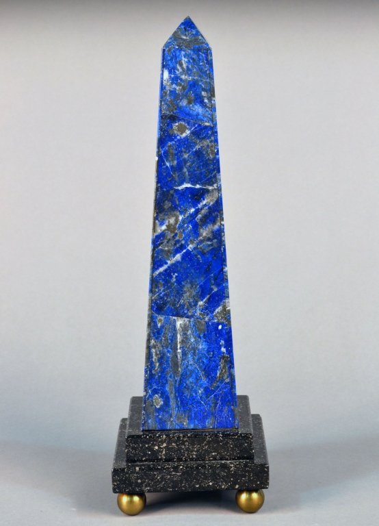 Hardstone Obelisk: Lapis Lazuli veneered obelisk on a marble base with brass ball feet. Height 14 1/2 inches.