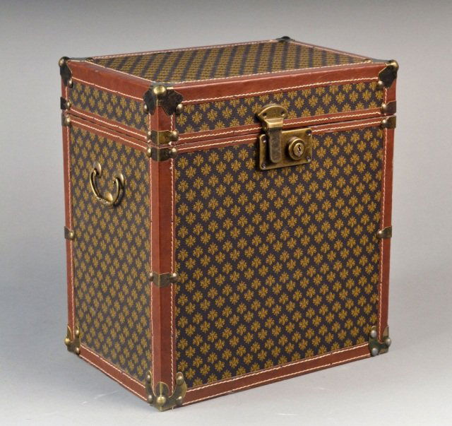 Vuitton Style Travel Box: Rectangular with fleur de lys decoration and brass trim. Height 14 1/2 inches, width 13 1/4 inches, depth 8 3/4 inches.