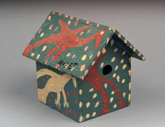 Mose Tolliver (American, 1920-2006): Painted Wood Bird House. Housepaint on plywood. Signed (on top). Size 6 1/4 H x 5 3/4 W x 7 D inches.