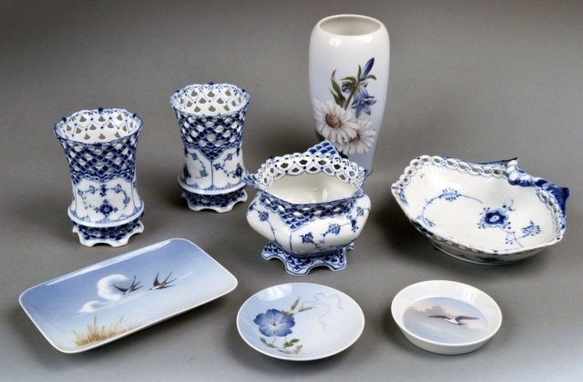 Miscellaneous Group of Royal Copenhagen Porcelain: 20th century, including a vase, a pair of blue and white vases with reticulated rims, a shell form dish, etc. Tallest 6 5/8 inches.