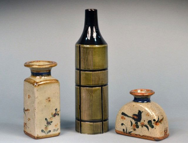 Set of Two Grey Stoneware Vases: Together with a French Art Deco ceramic bottle, height 12 inches.