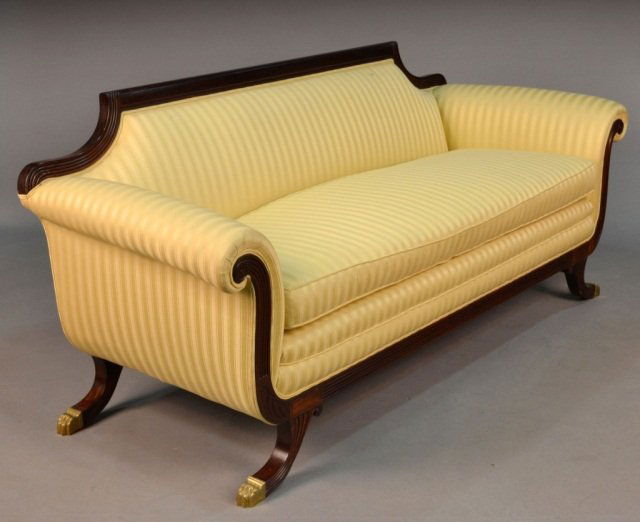 American Classical Mahogany Settee: In the style of Duncan Phyfe, yellow silk striped upholstery.