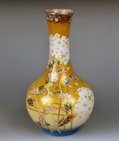 Chinese Faience Vase: Floral and butterfly decoration. Height 15 inches.