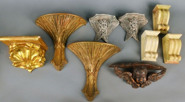 Miscellaneous Group of Decorative Wall Brackets: Including a pair of composition brackets with winged putti decoration, a carved wood putti decorated bracket, a gilt wood shell bracket, etc., together with a pair of wheat sheaf decorated hanging pla