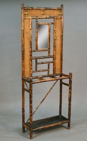 Regency Style Faux Bamboo Hall Stand: Three coat hooks above a mirror inset open back. Height 6 feet, width 27 inches, depth 12 inches.