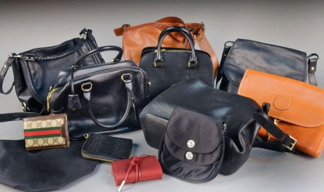 Miscellaneous Group of Designer Handbags: Including Louis Vuitton, Gucci, Prada, and Cavelli.