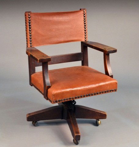 Attr to L & JG and Gustav Stickley Chair: Circa 1904, Model no. 363, oak office chair with swivel base, red decal. Height 38 3/4 inches. Provenance: Private Collection, Pasadena California, Christie's September 26, 2007. Lot 262