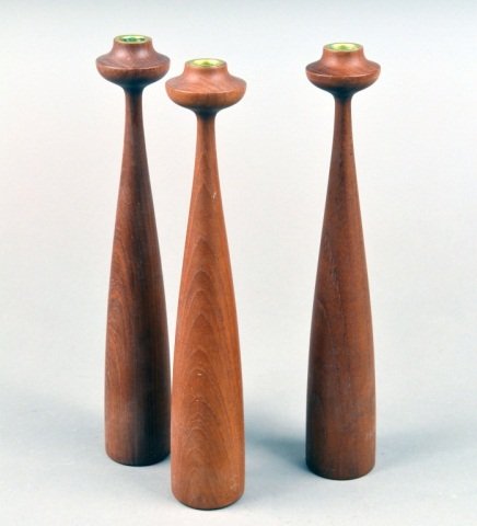 Set of Three Danish Teak Wood Candlesticks: Circa 1950. Height 14 1/2 inches.
