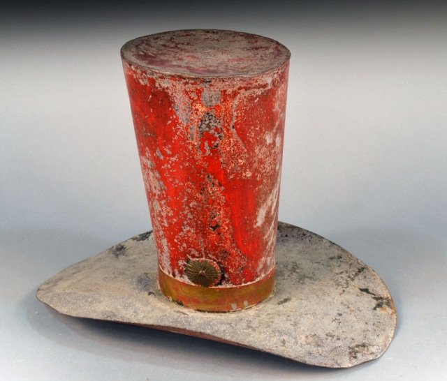 Painted Metal Hat Form Shop Sign: In the form of a red painted iron tall hat. Height 14 1/2 inches.