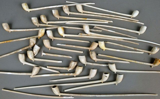 Group of Earthenware Pipes: Group of earthenware fragments of 'church warden' pipes recovered from the Adgillus. Provenance: Wreck of the British cargo ship Adgillus, lost in international waters of the Irish Sea 20th Oc