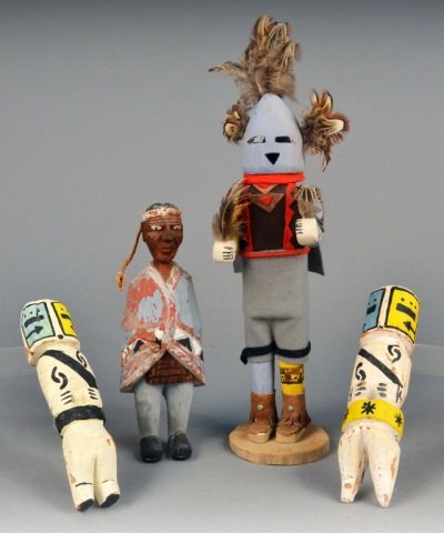 Four Native American Dolls: Three Katchina dolls and a wood Indian. Largest, height overall 17 inches.