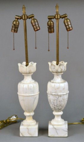 Pair of White Veined Alabaster Lamps: Urn motif. Height 25 inches.