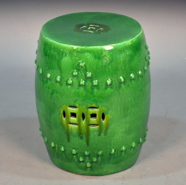 Green Glazed Ceramic Garden Seat: Early 19th century. Height 17 1/2 inches, diameter 13 inches.