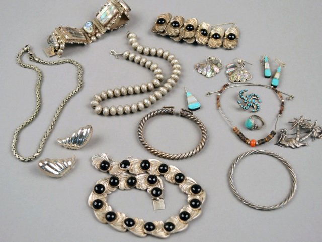 Miscellaneous Group of Silver Jewelry: Including a Mexican bracelet with abalone, a necklace and bracelet suite, bead necklace, earrings, ring, two pins, etc.