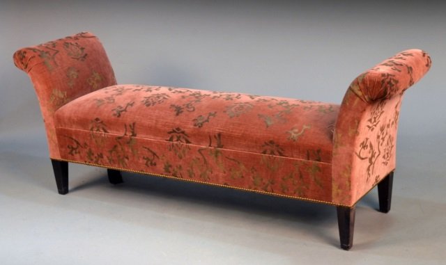 Upholstered Window Bench: Rectangular seat flanked by outscrolled arms on square tapered legs. Height 28 inches, length 6 feet, depth 20 inches.