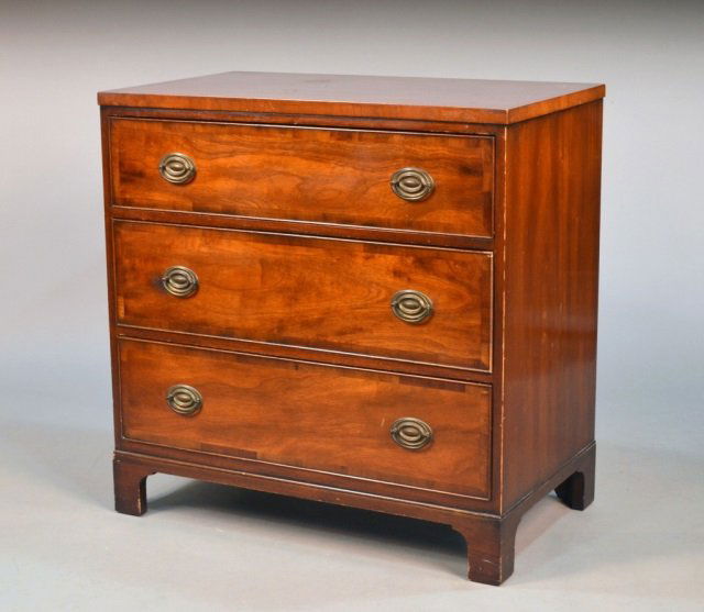 Kittinger Mahogany Chest of Drawers: Rectangular top over three graduated drawers, bracket feet. Height 34 inches, width 34 inches, depth 20 inches.