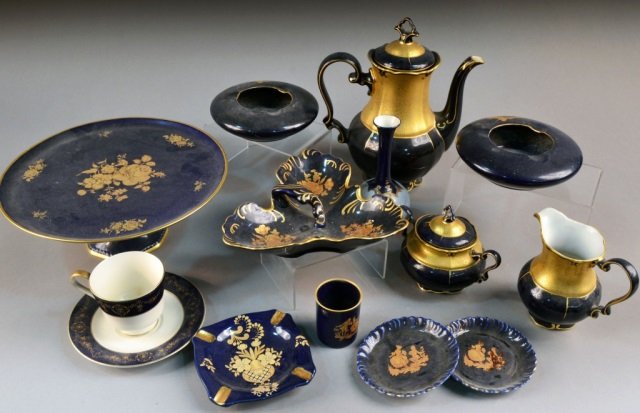 Group of Cobalt Porcelain Table Articles: Including a cake stand, a three piece coffee set, etc. Coffee pot height 10 3/4 inches. Provenance: Estate of Leo Barrile, Leo's Antiques in Bensonhurst NY