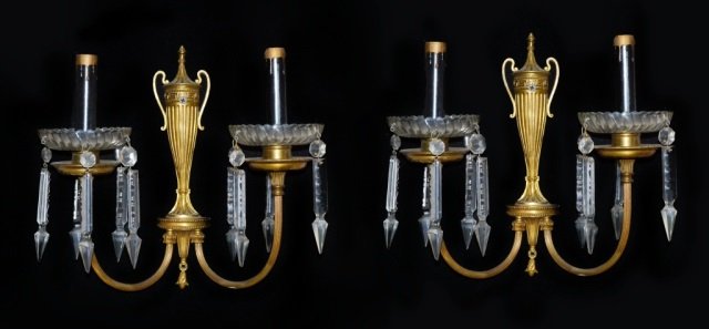 Pair of Gilt Metal Two Arm Sconces: Classical urn motif. Height 11 inches, width 12 inches. Provenance: Estate of Leo Barrile, Leo's Antiques in Bensonhurst NY