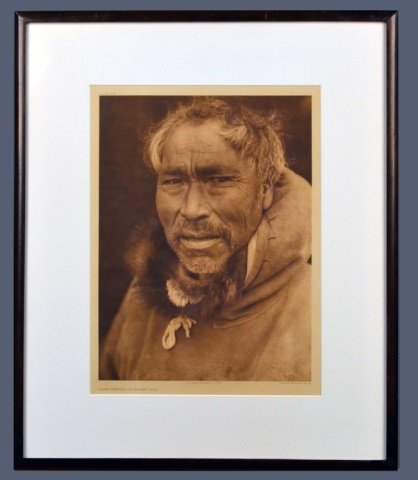 Edward Sheriff Curtis (American, 1868-1952): Cape Prince of the Wales Man. Vintage Photogravure, original image circa 1928, printed by John Andrew & Son and Suffolk Engraving Co. Credited (l.c.), copyrighted (l.r.), titled (l.l.), plate # 708 (u