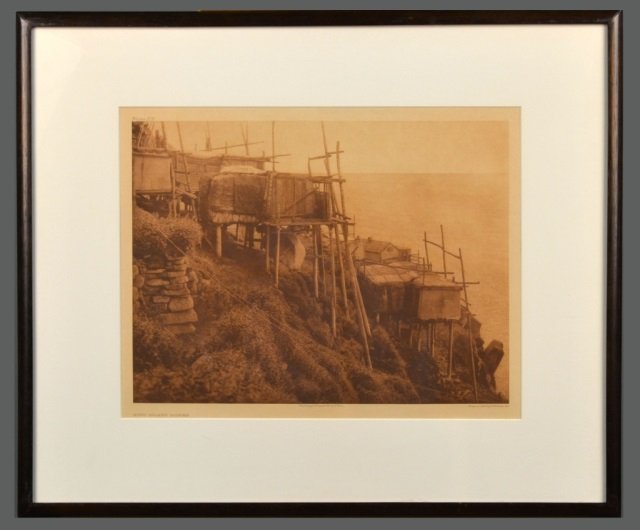 Edward Sheriff Curtis (American, 1868-1952): King Island Homes. Vintage Photogravure, original image circa 1928, printed by John Andrew & Son and Suffolk Engraving Co. Credited (l.c.), copyrighted (l.r.), titled (l.l.), plate # 702 (u.l.). Image