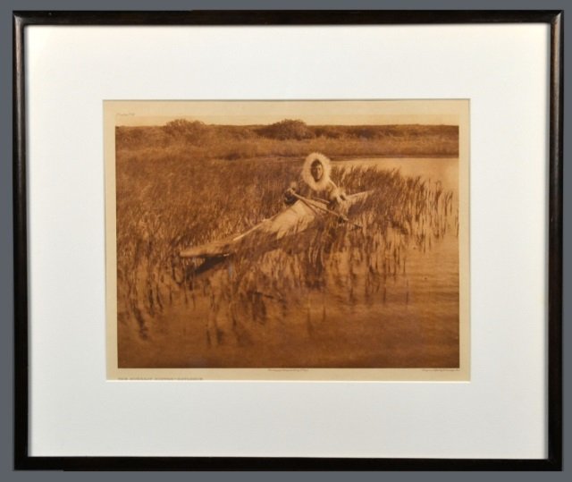 Edward Sheriff Curtis (American, 1868-1952): The Muskrat Hunter - Kutzebue. Vintage Photogravure, original image circa 1928, printed by John Andrew & Son and Suffolk Engraving Co. Credited (l.c.), copyrighted (l.r.), titled (l.l.), plate # 714 (