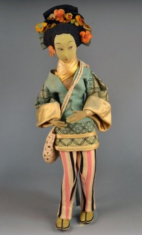 Lenci "Chinese Maiden" Doll: Circa 1930, holding a crocheted bag. Height 22 inches.