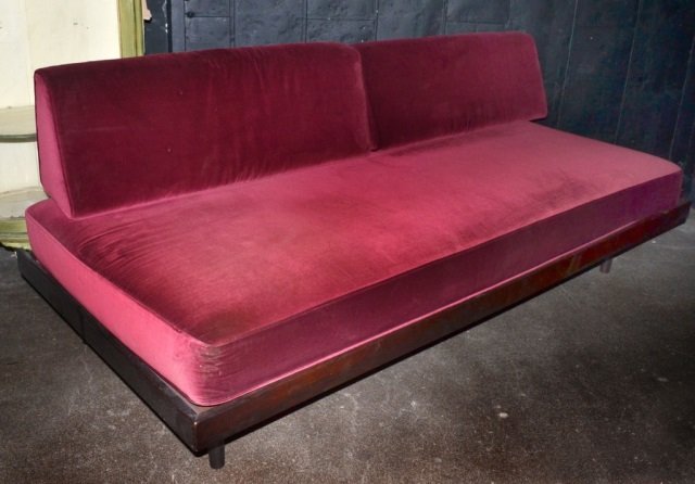 Mid Century Modern Teak Sofa: Rust cushions. Height 26 inches, width 6 feet 6 inches, depth 38 inches.