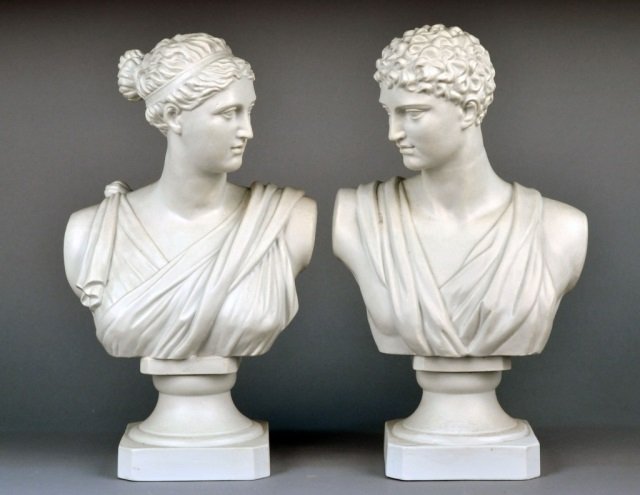 Pair of Parian Busts: Each, a classical figure, man and woman. Height 17 1/2 inches.