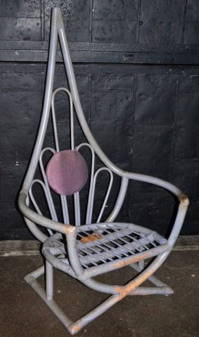 Painted Corner Chair: Abstract bent wood design, upholstered cushion back. Height 57 inches, width 35 inches, depth 24 inches.