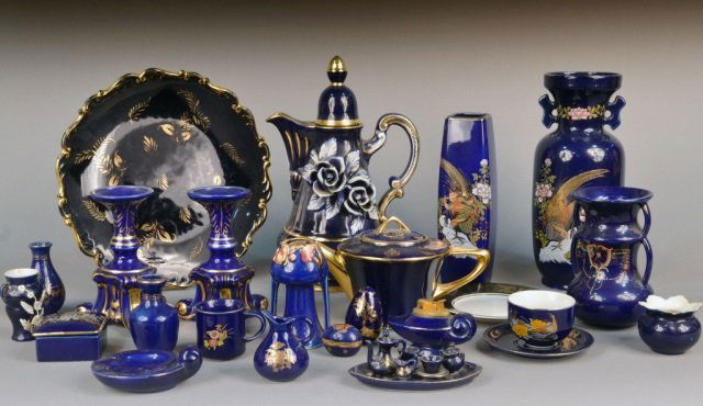 Miscellaneous Group of Cobalt Porcelain Articles: Including a coffee pot, tea pot, five vases, a pair of candlesticks, three trinket boxes, a mini tea set, etc. Coffee pot height 13 inches. Provenance: Estate of Leo Barrile, Leo's Antiques in Bensonh