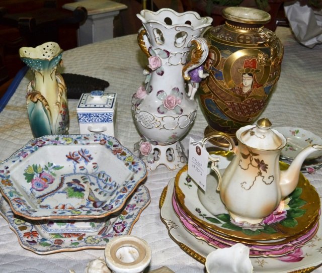 Miscellaneous Group of Porcelain Table Articles: Including a Satsuma vase, a mason's center bowl with under tray, a vase with applied figural and floral decoration, cups, saucers, plates, etc. Tallest vase 12 1/2 inches.