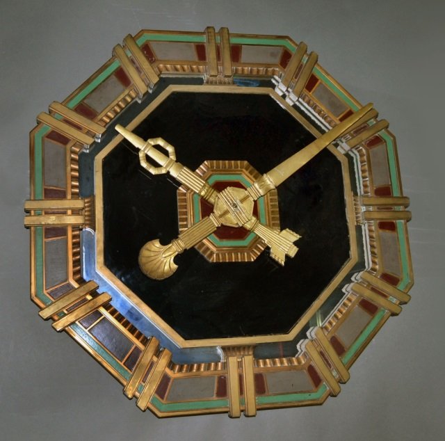 Octagonal Bronze Wall Clock: Double bar chapters. 31 x 31 inches.