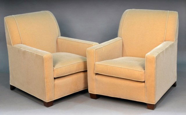 Pair of Contemporary Upholstered Lounge Chairs: Each, beige velour upholstered, with rectangular back and arms, cushioned seat, tapered block feet. Labeled Todd Hase, New York. Height 35 inches, width 32 inches, depth 32 inches.