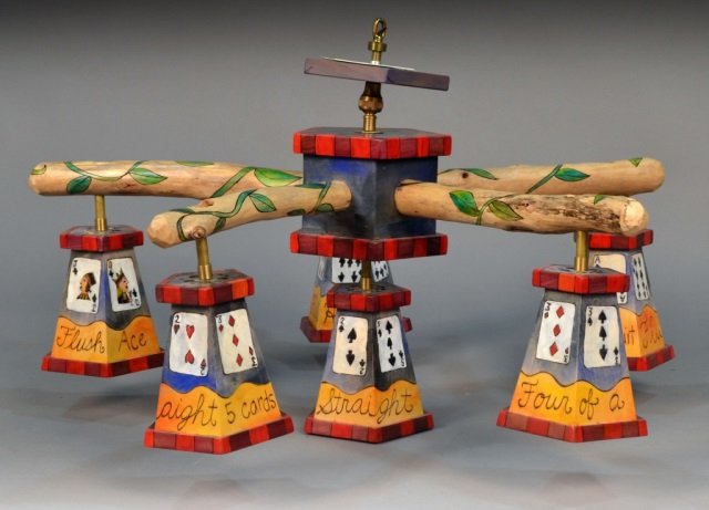 MacKenzie Childs Style Six Light Chandelier: Deck of cards motif, with each pentagonal light hand painted with playing cards depicting a hand of poker. Height 19 inches, diameter 36 inches.