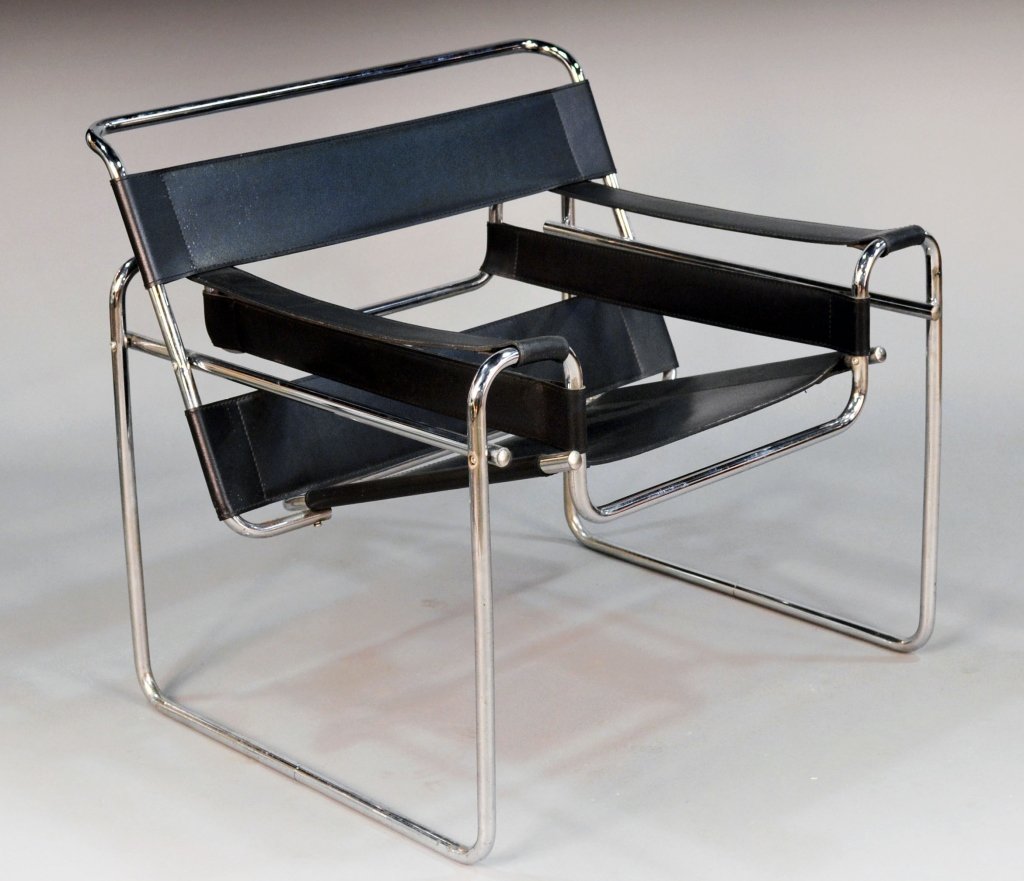 Marcel Breuer Wassily Armchair: Stretched black leather straps on a tubular metal frame. Height 29 inches, width 30 1/2 inches, depth 26 inches.