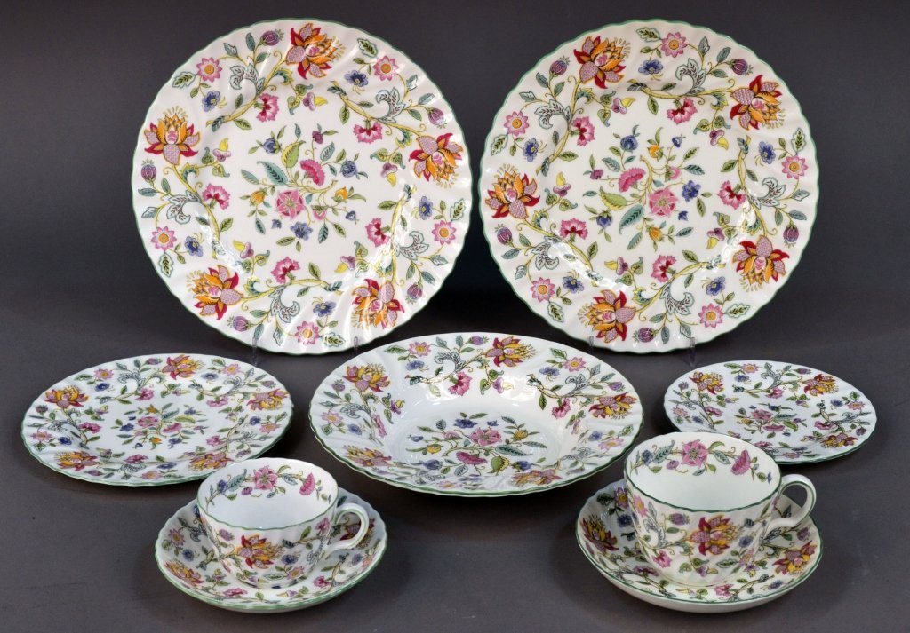 Minton Porcelain Dinner Service: Haddon Hall pattern, comprising thirty-eight dinner plates, thirty-eight salad plates, twenty-six bread plates, twelve soup bowls, twenty teacups, twenty saucers, eight coffee cups, eleven saucers, an