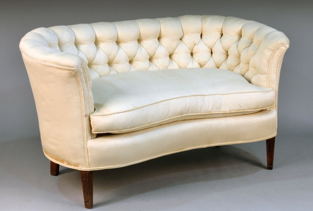 Button Back Upholstered Settee: Button tufted elongated barrel back, shaped rectangular seat, square tapered legs. Height 31 inches, width 56 inches, depth 28 inches.