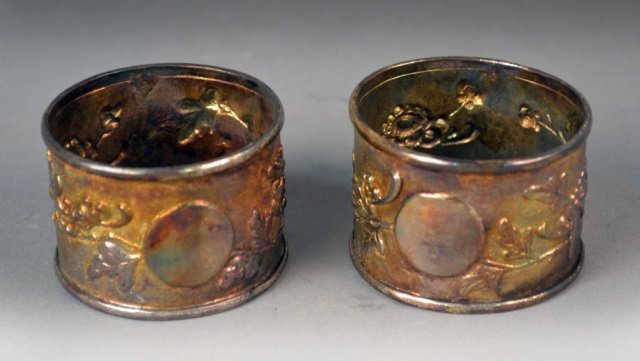 Two Chinese Silver Napkin Rings: Fruit and vine decoration. 1 ounce.