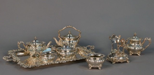 Gorham Sterling Silver Coffee & Tea Service: Retailed by Black Starr & Frost, comprising a kettle on stand, coffee pot, teapot, milk jug, sugar bowl and waste bowl and matching sterling silver serving tray. Total 340 ounces.
