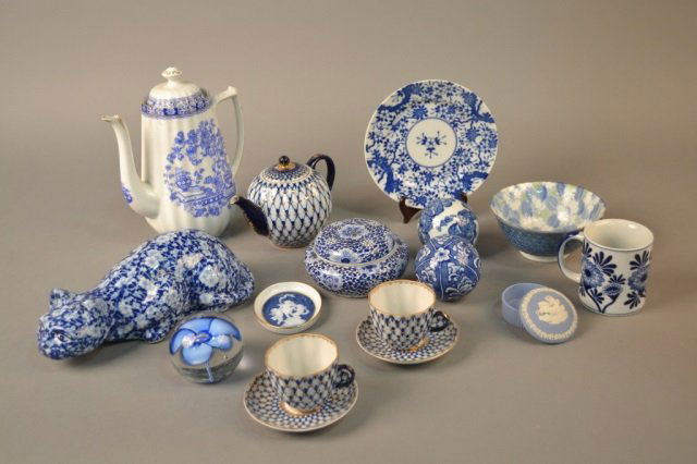 Group of Blue & White Porcelain Table Decorations: Including a tea for two set, carpet balls, paperweight, coffee pot, etc. Coffee pot, height 10 inches.