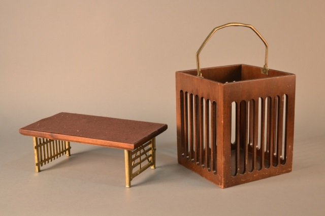 Mahogany and Brass Basket and Bookrack: Square swing handle basket, height over handle, 18 inches, bookcase, length 15 3/4 inches.