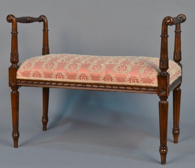 Neoclassical Style Upholstered Window Bench: With two raised fluted arms, rectangular upholstered seat, on fluted tapered legs. Height 24 3/4 inches, width 30 1/2 inches, depth 15 inches.