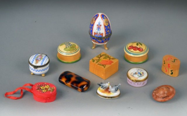 Group of Trinket Boxes and Decorations: Including Limoges porcelain trinket boxes, a simulated tortoise shell box, and wood trinket boxes.