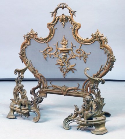 Fire Screen and Pair of Andirons: Neoclassical style, cartouche shaped screen decorated with a central urn, together with a pair of figural andirons. Screen, height 32 inches.