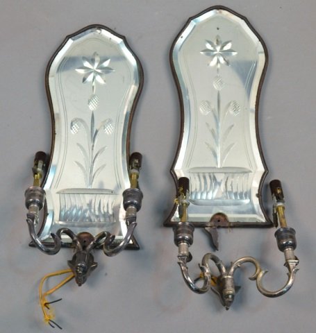 Pair of Mirrored Back Sconces: Two light sconces with etched stylized floral decoration. Height 16 inches.