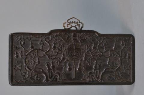 Carved Ebony Wall Plaque: Leafy vine decoration. Height 6 1/2 inches, width 15 inches.
