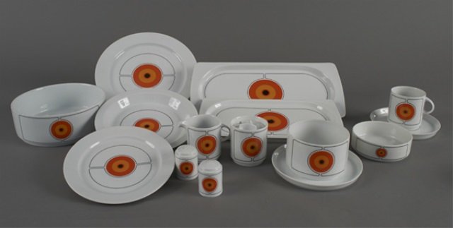 German Porcelain Dinner Service: By Thomas, Eclipse pattern, twelve dinner plates, twelve salad plates, twelve bowls, twelve fruit bowls, twelve cups, twelve saucers, and various serving pieces. Dinner plate diameter 10 inches.