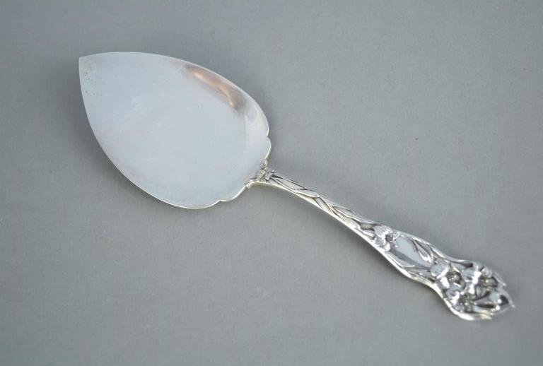 American Sterling Silver Casserole Server: Floral pattern. Length 9 3/4 inches, 4 ounces.