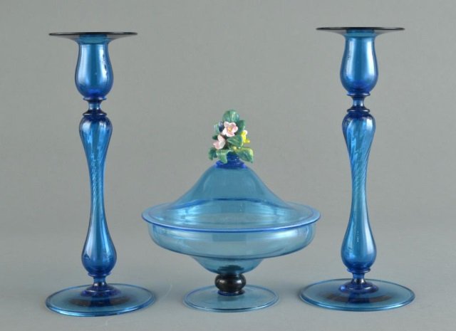 Blue Glass Garniture: Covered compote and a pair of candlesticks. Candlesticks, height 12 inches.