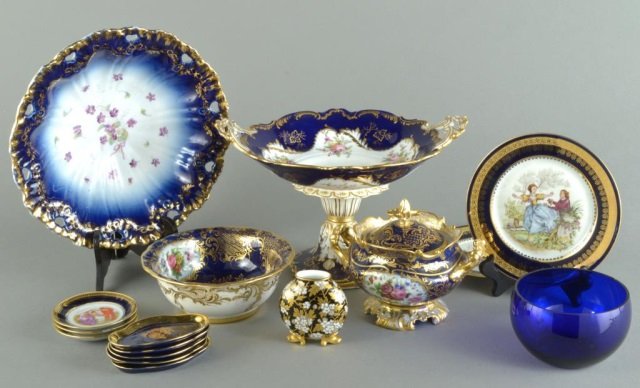 Group of Cobalt & Gilt Decorated Table Decorations: Including a compote, a covered dish, a small vase, etc. Compote, height over handles, 8 1/2 inches.